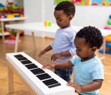 brothers playing keyboard together